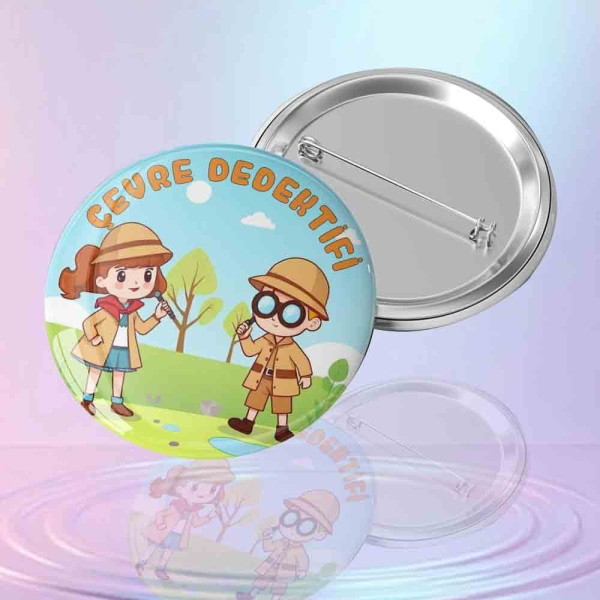 Çevre dedektifi yazılı, elinde büyüteç olan kız ve erkek çocuk resimli doğa temalı buton rozet